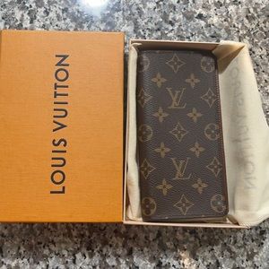 Brand new Lv wallet. Never taken out of covering